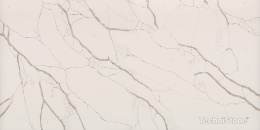 Technistone Crystal Calacatta Silva-inspirowana jest klasyczną Calacattą – z wyraźnymi, szarymi żyłkami o chłodnym, eleganckim rysunku, rozproszonymi na ciepłym, białym tle.