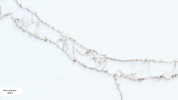 Avant Quartz Calacatta Bearn to biały konglomerat kwarcowy z nieregularnymi, postrzępionymi żyłkami w odcieniach brązu