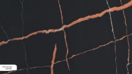 Avant Quartz Calacatta Marseille to konglomerat kwarcowy z nieregularnymi żyłkami w odcieniach miedzi z pomarańczowymi akcentami