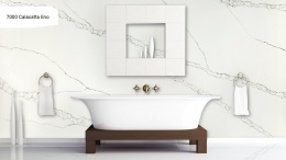 Avant Quartz Calacatta Eno to biały konglomerat kwarcowy z regularnym użyleniem w odcieniach szarości,