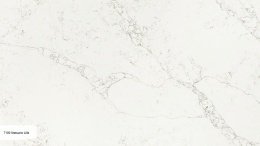 Avant Quartz Statuario Lille to konglomerat w odcieniu kości słoniowej z delikatnymi kredowymi rysami i szaro-brązowymi żyłami