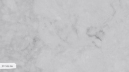 Caesarstone Noble Grey to stylowy konglomerat kwarcowy o średnioszarej bazie i wyrazistym białym żyłkowaniu.