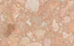 Ciepły róż z nutami brzoskwini, kremu i beżu, z naturalnymi fragmentami marmuru o jaśniejszych i ciemniejszych akcentach