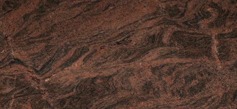 Multicolor Rojo – spektakularny granit naturalny klasy EX o intensywnej czerwono-brązowej palecie z akcentami beżu i czerni,