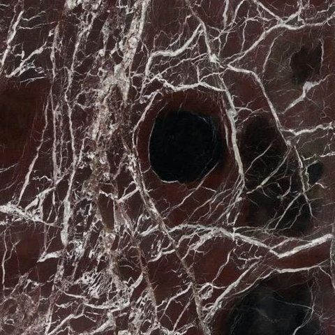 Rosso Lepanto to marmur naturalny klasy EX, który zachwyca szlachetną, ciemnoczerwoną kolorystyką i wyrazistym kontrastem żył.