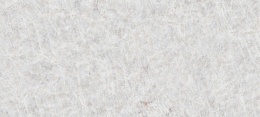 Cristallo to płyta w odcieniach bieli, mleka i lodowej szarości, z siatką naturalnych żyłek oraz drobnymi stonowanymi plamkami