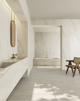 Łazienka wykończona płytami Infinity MB27 Calacatta Brasile w jasnych tonach.