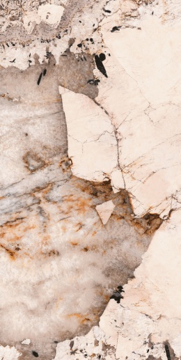 Magellano OC04 łączy beżowo-złotą bazę z dynamicznymi brązami, rudościami i czarnymi akcentami,