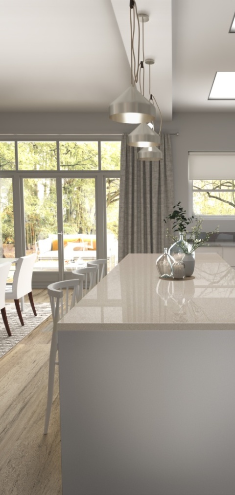 Kuchnia z polerowanym spiekiem Dekton Dunna na blacie i stole, z jasnymi frontami, czarną baterią i drewnianymi krzesłami.