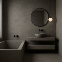 Nowoczesna łazienka w szarościach z betonowym spiekiem Infinity Concrete Grey, wanną i wiszącą umywalką