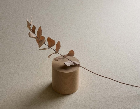 Zbliżenie na fakturę spieku Infinity Arkeon Plaster Bone Matte w jasnobeżowo-szarej tonacji z matowym wykończeniem.