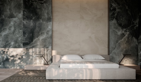 Sypialnia z dekoracyjną ścianą z płyt Laminam Lamborghini Tempestas w ciemnym marmurowym stylu