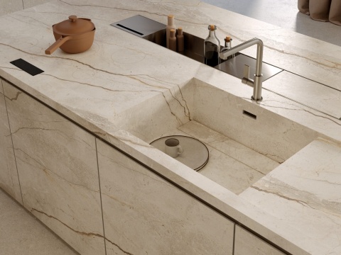 Nowoczesny zlew zintegrowany z blatem ze spieku Marazzi Silver Root White w kuchni.