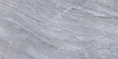 Nuvola wyróżnia się delikatnymi odcieniami szarości z łagodnym dynamizmem powierzchni