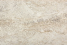 Zbliżenie na płytę Dekton Arga o kremowo-beżowej kolorystyce z delikatnym połyskiem.