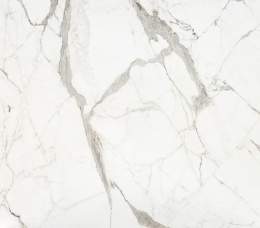 Fragment płyty Dekton Daze – powierzchnia w białym kolorze z grafitowo-szarymi żyłami, wykończenie velvet.