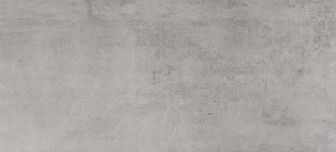 Duży slab Dekton Kreta w jednolitej, szarej tonacji z subtelnymi niuansami przypominającymi naturalny beton, w matowej fakturze.