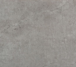 Fragment płyty Dekton Soke w odcieniach szarości z realistycznym rysunkiem betonu.