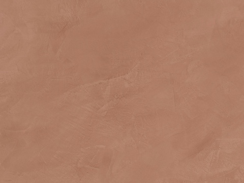 Zbliżenie na powierzchnię Dekton Umber w matowym wykończeniu, w ciepłym terakotowym kolorze.