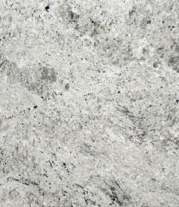 tekstura materiału z wyraźniejszymi punktami mineralnymi, ukazująca charakterystyczny wzór kamienia.