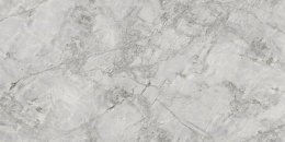 Supergrey prezentuje stonowane, szaro-betonowe tło z subtelnymi żyłkami, które nadają powierzchni charakteru i ruchu