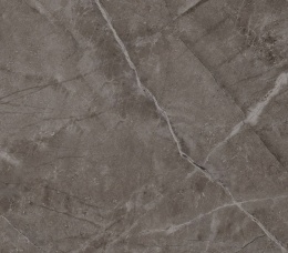 Zbliżenie na powierzchnię Dekton Kira z szarym tłem i subtelnymi jasnymi żyłami.