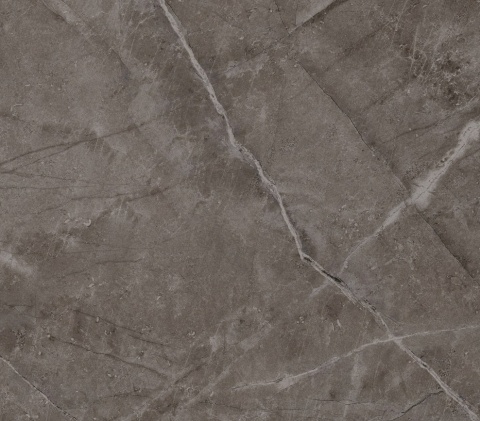 Zbliżenie na powierzchnię Dekton Kira z szarym tłem i subtelnymi jasnymi żyłami