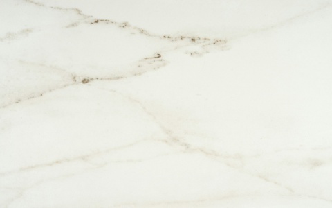 Miniatura płyty Dekton Rem ukazująca jasne tło z beżowo-szarymi żyłami.