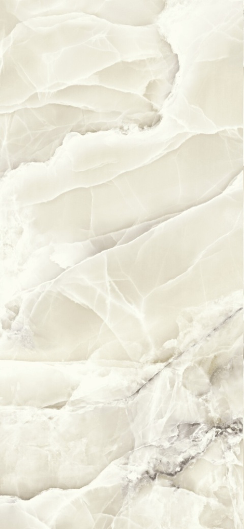 Ciepły spiek kwarcowy Grespania Alaska Ambar Pulido – kremowy onyks z połyskiem i efektem głębi.