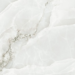 Wzór spieku Grespania Alaska Hielo Pulido – biały onyks z delikatnymi szarościami.