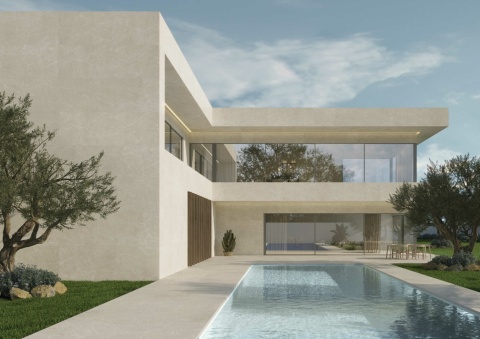 Nowoczesna elewacja domu wykończona płytami Zarci Marfil Natural w ciepłym odcieniu beżu