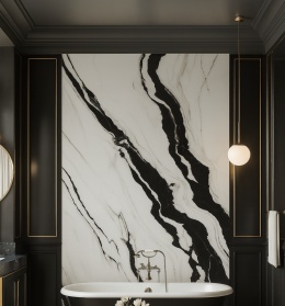 Łazienka art déco ze spiekiem Panda Grespanii, czarna wanna, złote detale, neutralne światło