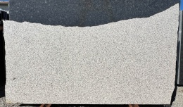 płyta Cristal Cream w wykończeniu polerowanym, ukazująca jednolitą, kremową powierzchnię z subtelnymi beżowymi przejściami.