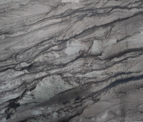 Fragment kamienia w wersji szczotkowanej, ukazujący matową fakturę i równomierne rozłożenie ziaren.