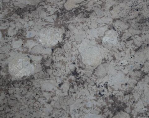 Pierwsze zdjęcie – płyta Mona Lisa w wykończeniu naturalnym, pokazująca matową powierzchnię z widoczną strukturą kamienia