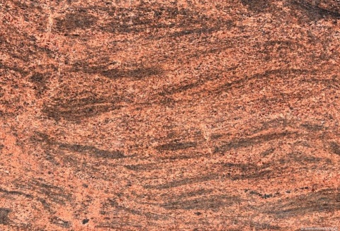 intensywne przejścia barw od czerwieni przez pomarańcz i róż aż po brąz i czerń, z wysokim połyskiem powierzchni