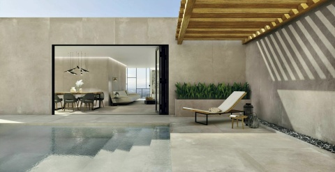 Ściana wykończona spiekiem MOMA GRIS NATURAL, surowa szarość, nowoczesne wnętrze