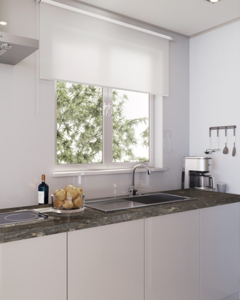 Nowoczesna kuchnia z blatem z granitu Paradiso w ciemnoszarej tonacji ze złotymi akcentami