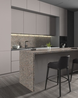 Nowoczesna kuchnia z wyspą wykończoną granitem Rosa Porino o beżowo-różowym, drobnoziarnistym wzorze