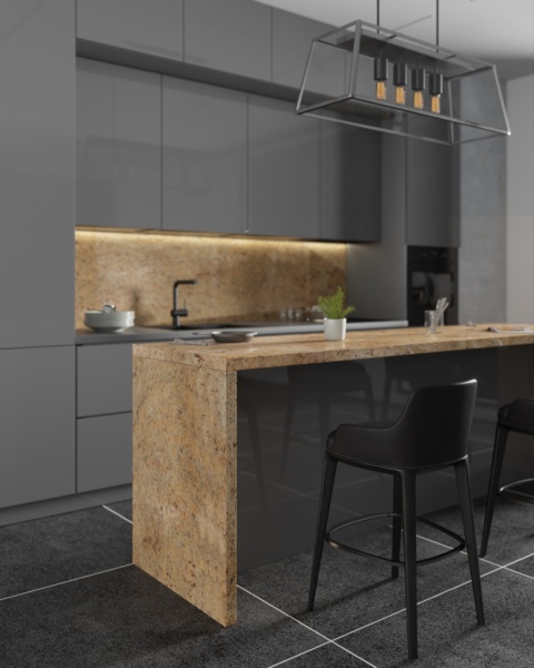 Nowoczesna kuchnia z wyspą wykończoną granitem Shivakashi w ciepłej beżowo-kremowej tonacji z ciemnymi żyłkami