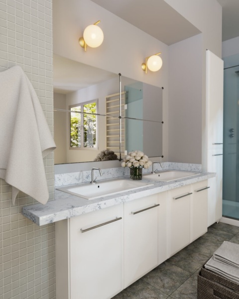 Łazienka z blatem z aglomarmuru Storm z wyraźnym użyleniem i umywalkami wpuszczanymi