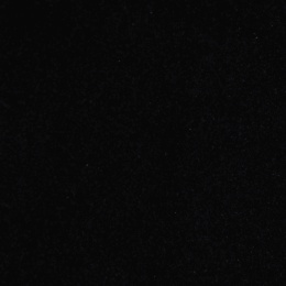 Zbliżenie struktury granitu Absolute Black o jednolitym, głębokim czarnym wykończeniu