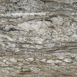 Granit Blue Dunes – kamień w odcieniach beżu, brązu i szarości z naturalnym, falistym rysunkiem