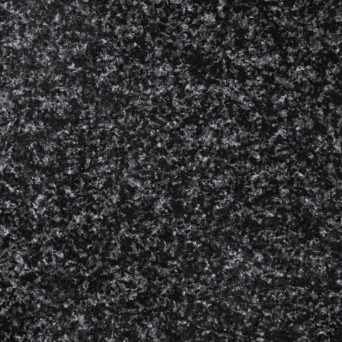 Zbliżenie struktury granitu Impala Oryginalna RPA o ciemnoszarej, drobnoziarnistej i naturalnie melanżowej powierzchni