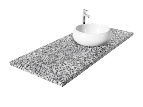 Blat z granitu Strzegom z nablatową umywalką, o jasnoszarej, drobnoziarnistej i naturalnej strukturze