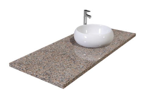 Blat z granitu Rosa Porriño z nablatową umywalką, o różowo-szarej powierzchni z równomiernym drobnym uziarnieniem