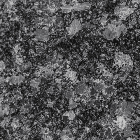 Granit Steel Grey detal struktury w szaro-grafitowym odcieniu z charakterystycznym ziarnem