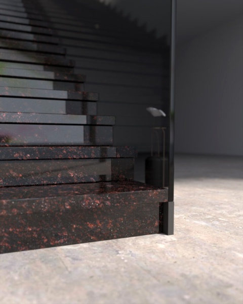 Schody wykończone cokołem z granitu Tan Brown o ciemnej, połyskującej powierzchni z brązowymi akcentami