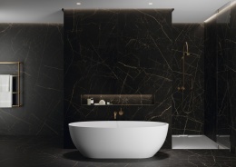 Nowoczesna łazienka wykończona spiekiem Grespania Nero Ardi Natural – elegancka czerń z delikatnym złotym żyłkowaniem.