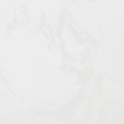 Aglomarmur Carrara – biały kamień z subtelnym szarym użyleniem, elegancki i ponadczasowy wybór do wnętrz.